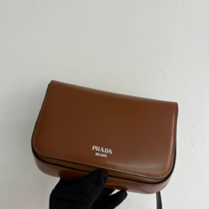 prada brushed leather mini bag with shoulder strap 3.webp