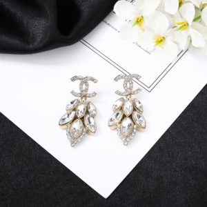 chanel gold leaf earrings